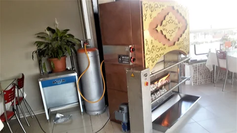 Gas & lava rock lamb rotisserie · Two spits — AG-063 — Product view 2